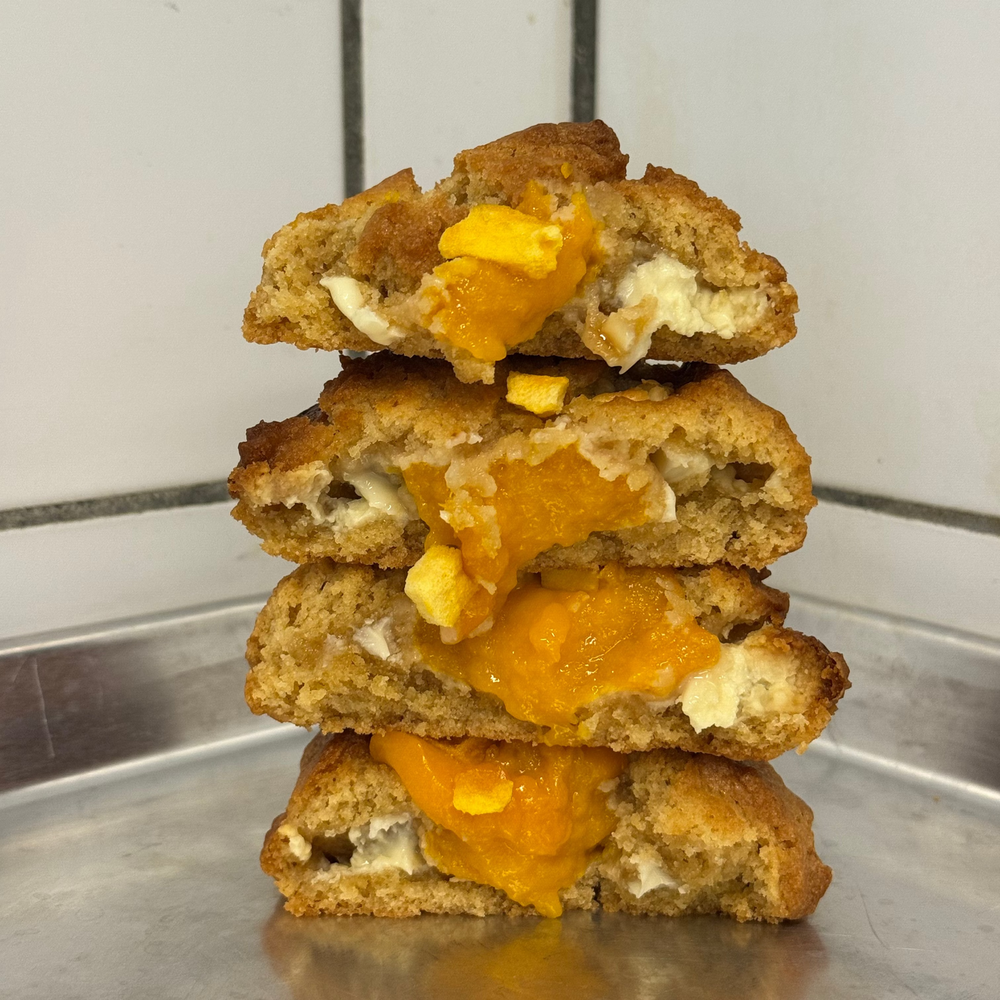 Stack of mango white chocolate cookies